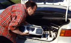 Phil Kline loading up tape recorders